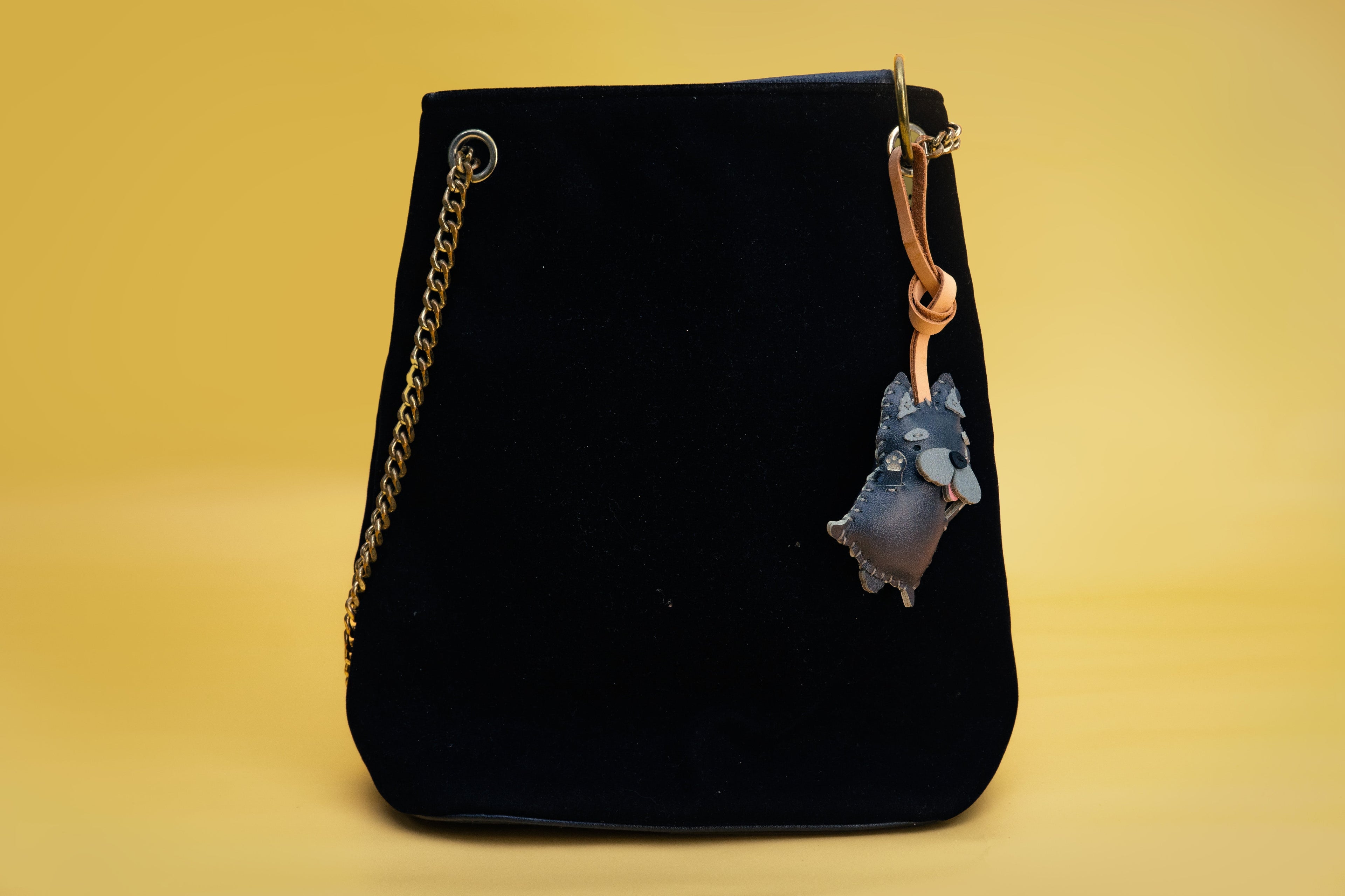 Secrets to styling black bag charms for an All Black look