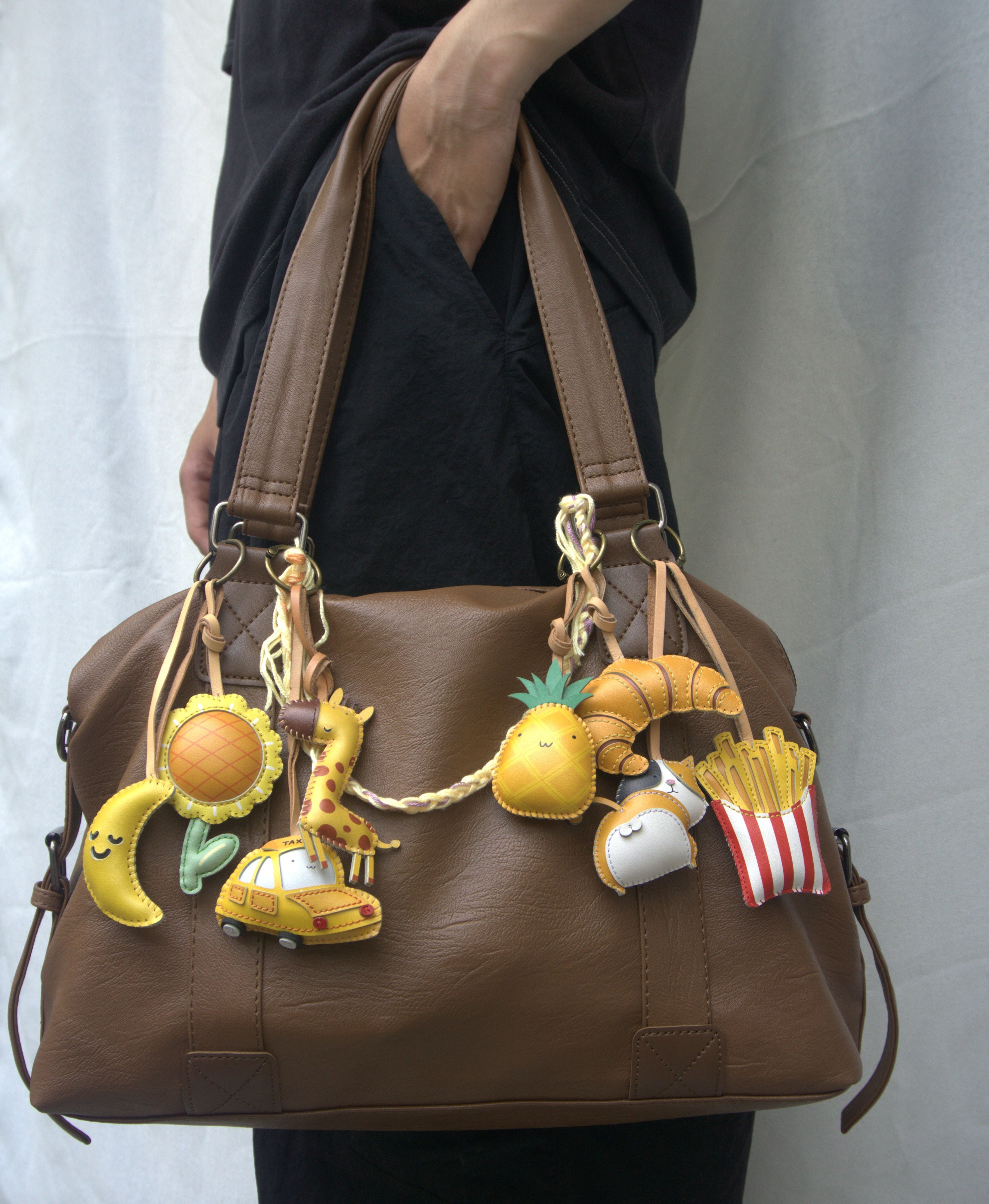 10 must-have designer bag charms to personalize your luxury tote