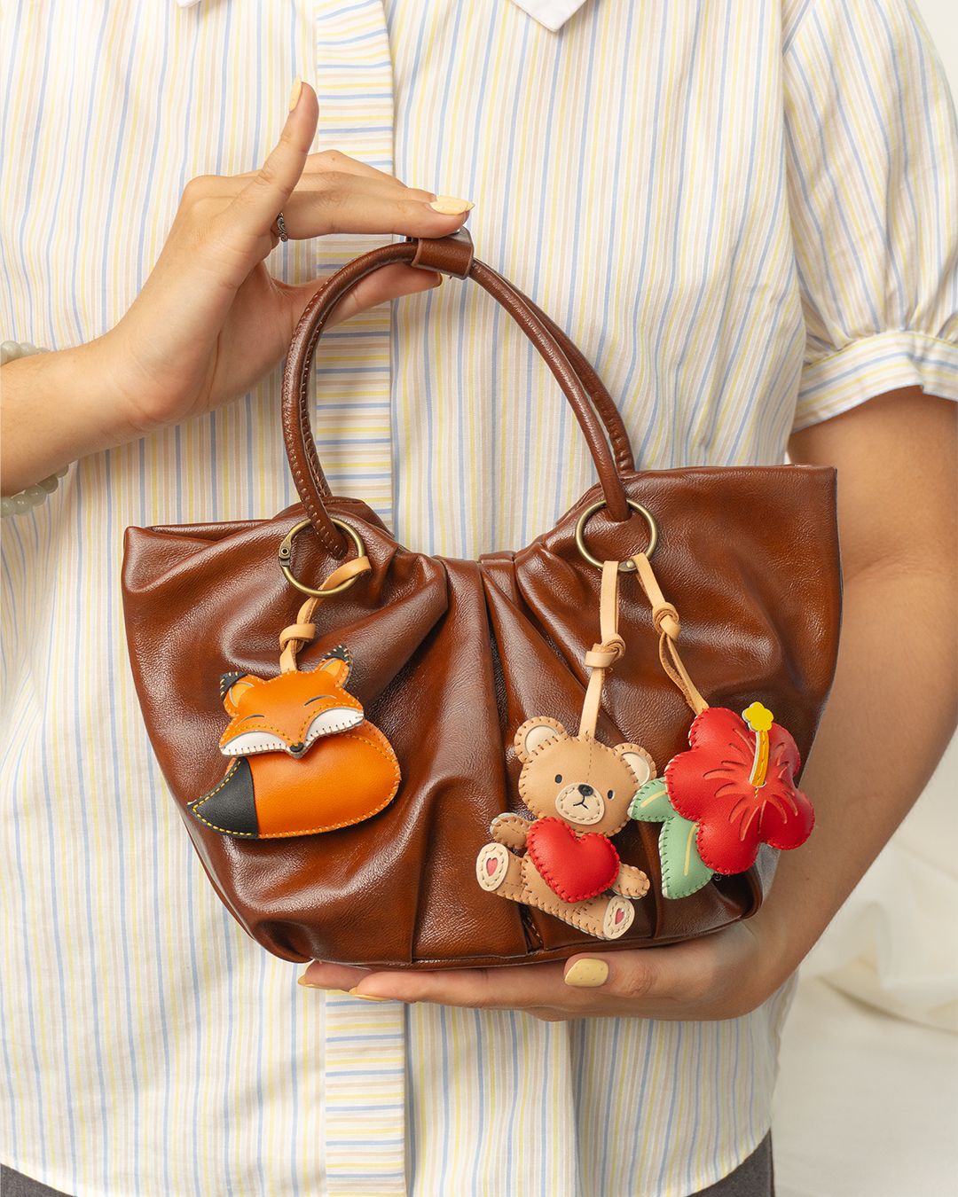 Why every girl needs a plush bag charm in her collection