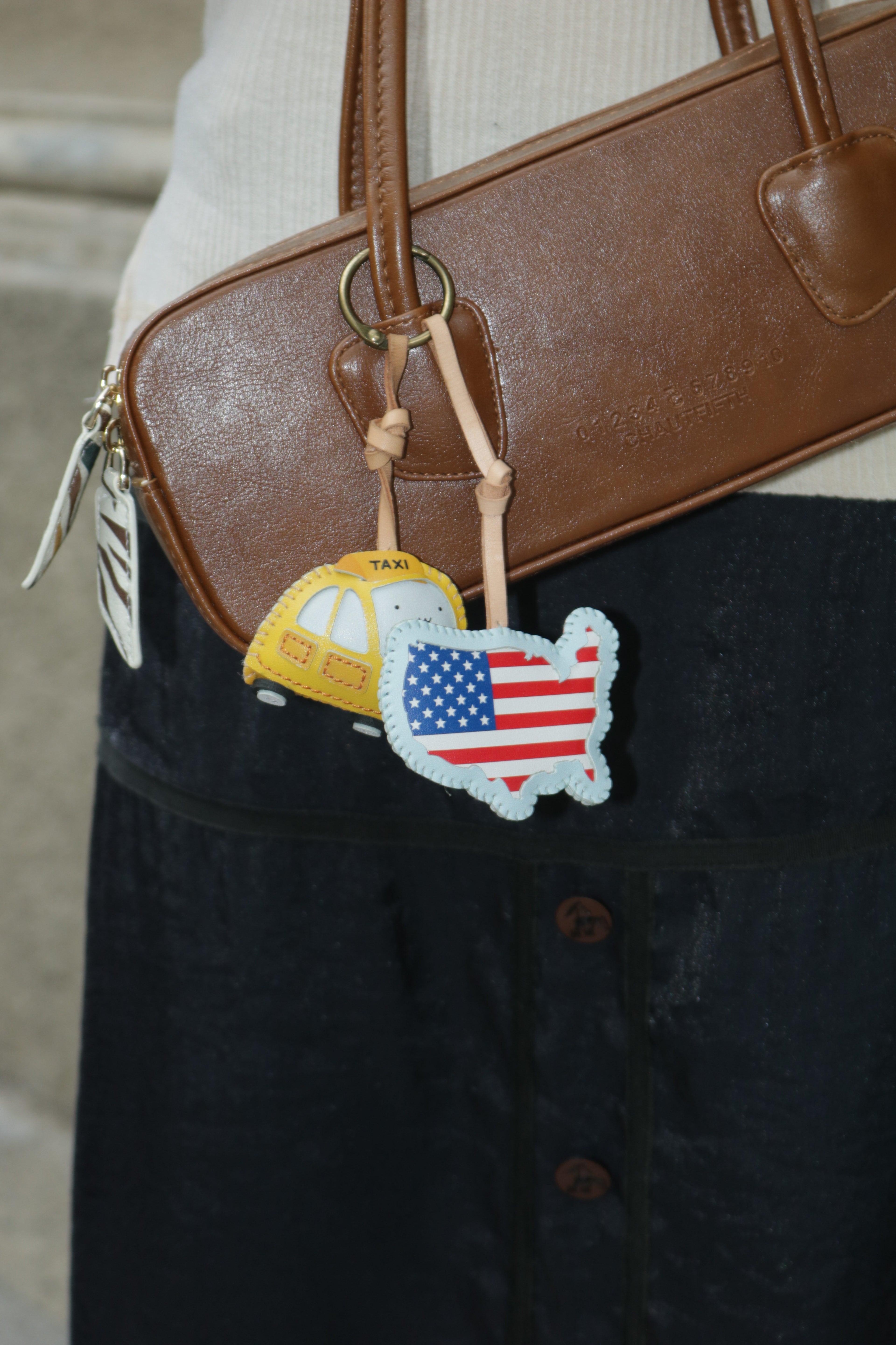 American Collection Leather Charm